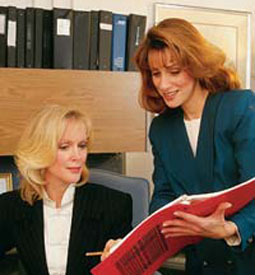 women looking at a file